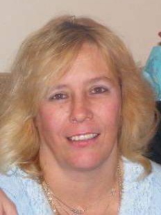  Julie A. (St. George) Sly, 55 