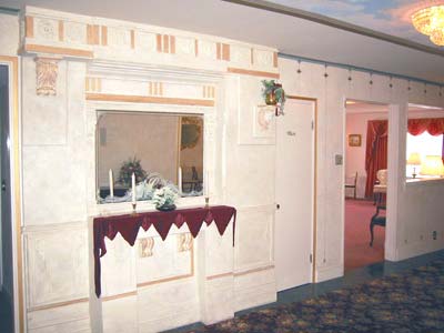 Room with Mirror and decorated shelf